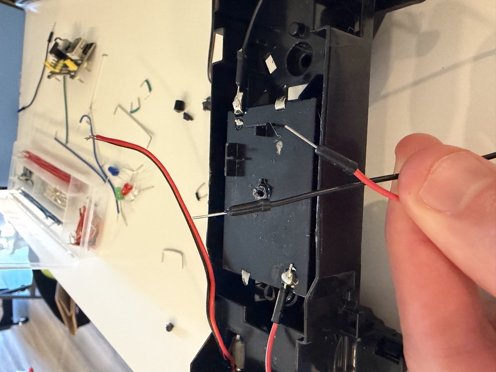 the motors with their freshly-installed leads ready for the breadboard